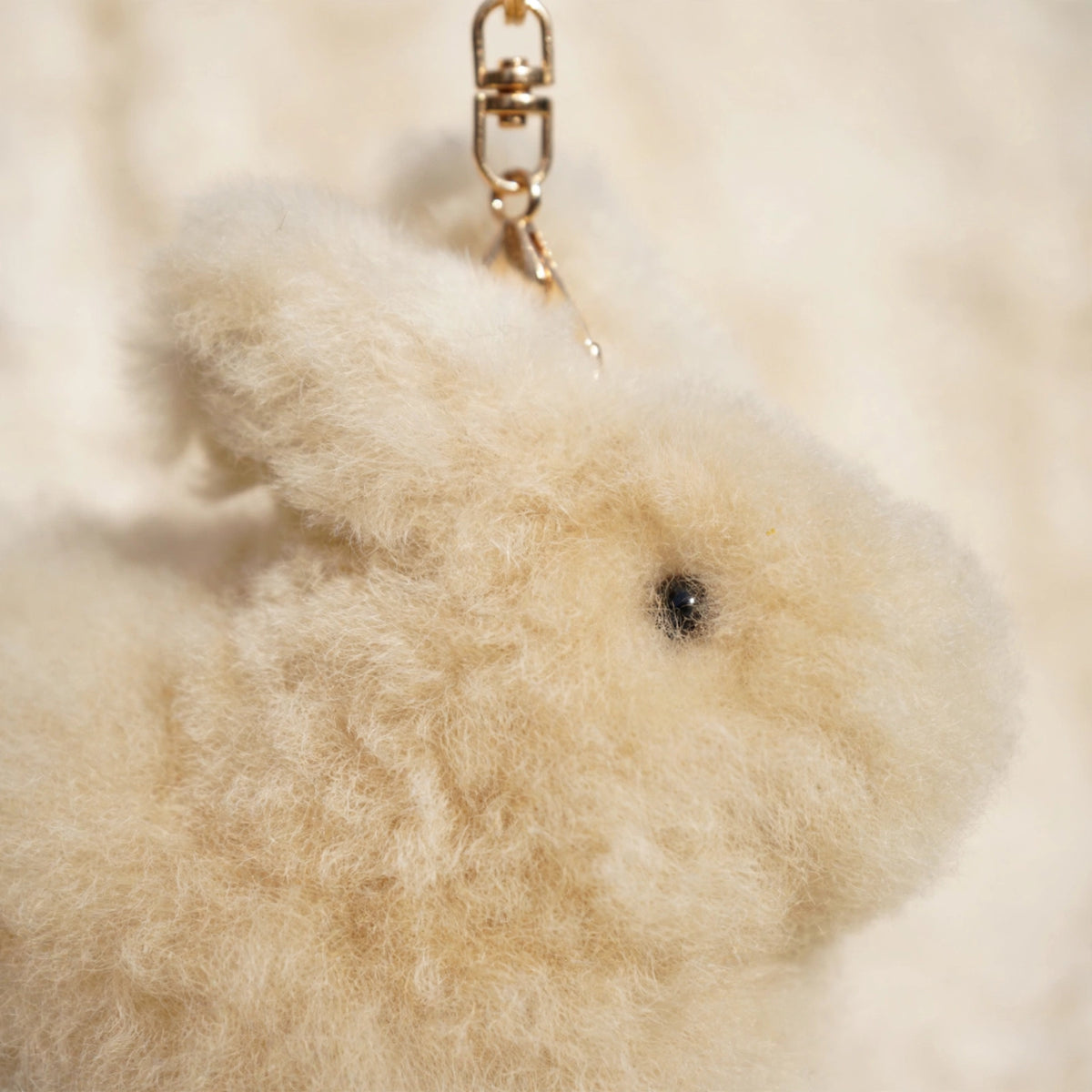 Close-up of soft real alpaca fur on the bunny keychain