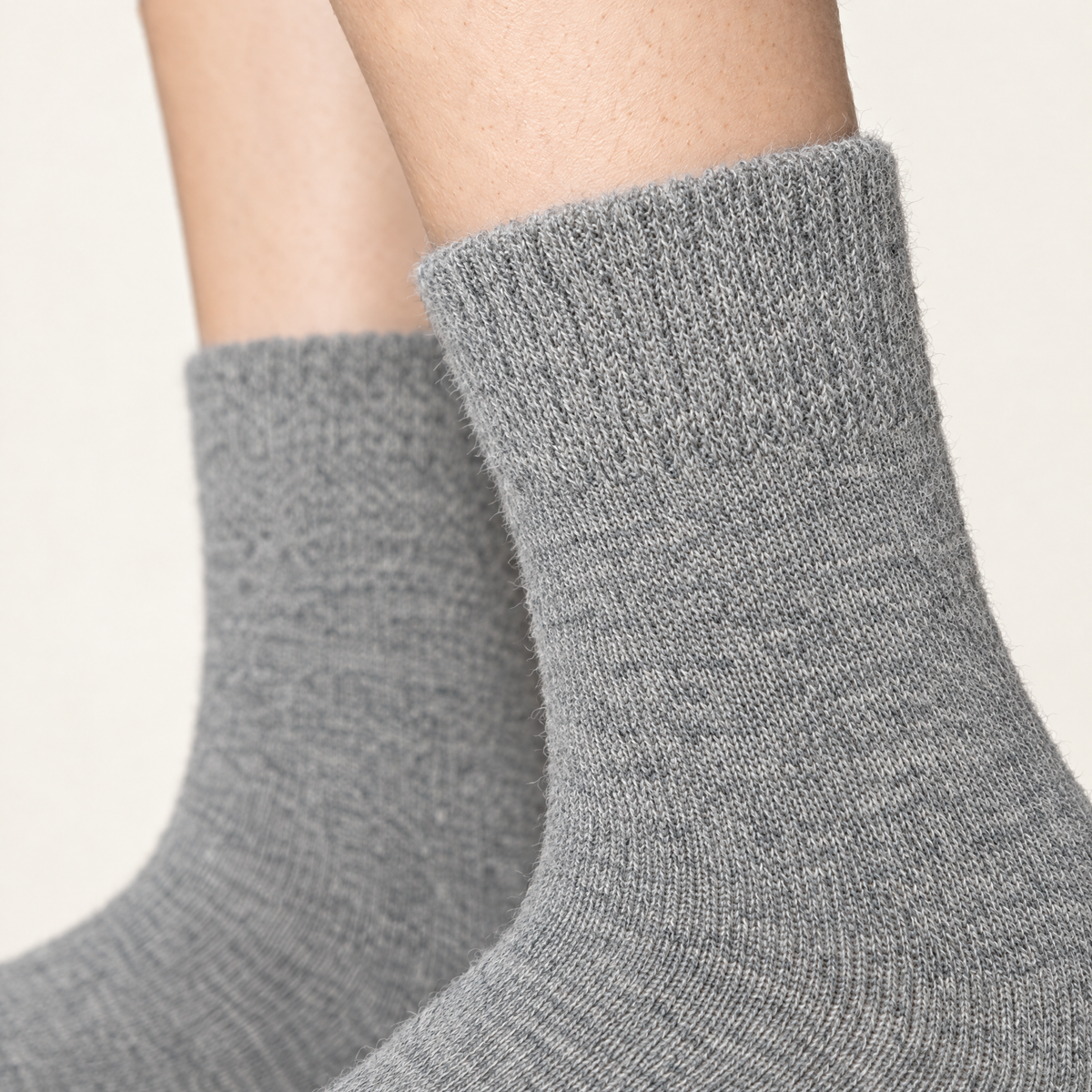 Close-up of the grey alpaca knit and cuff