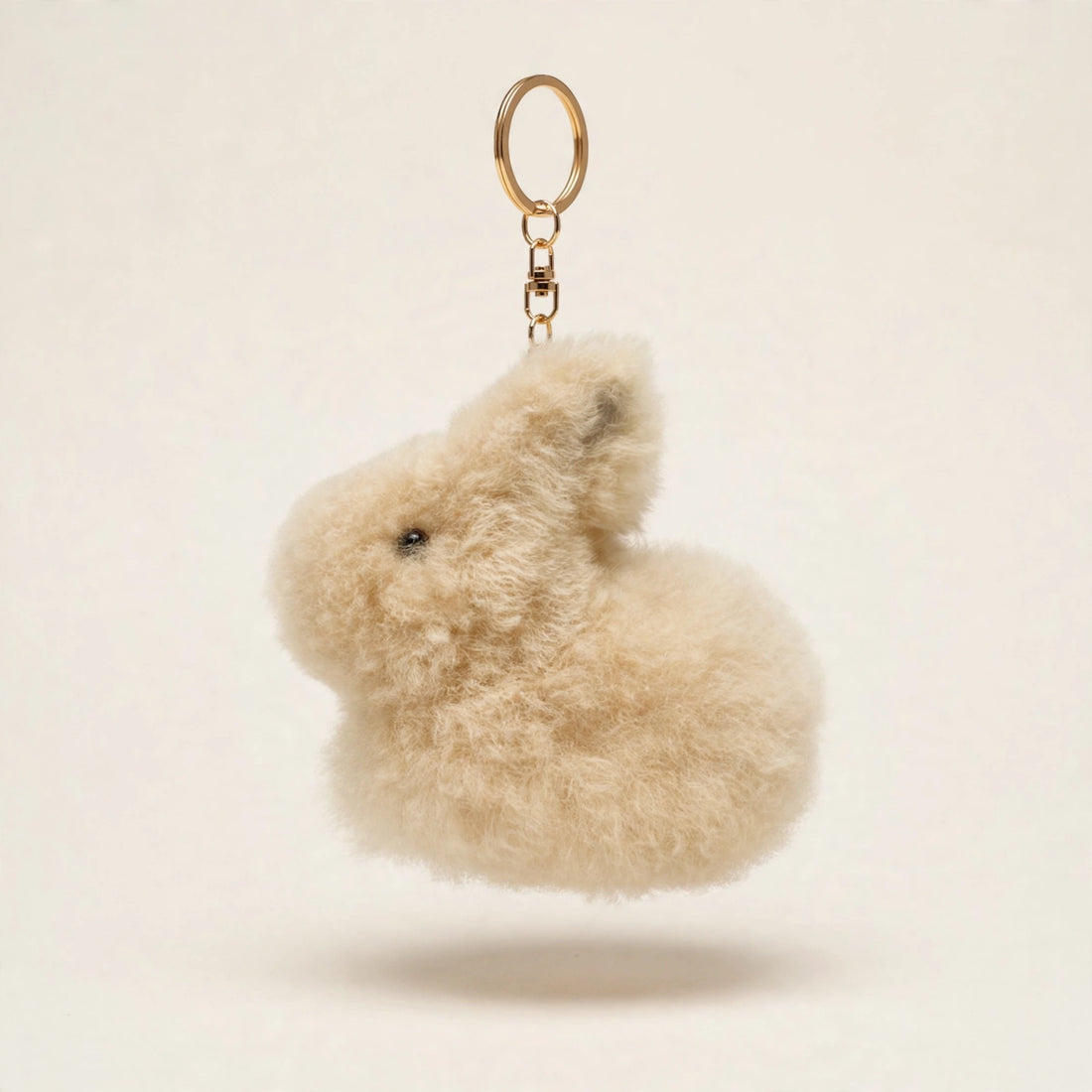 Alpaca fur bunny keychain in natural beige with gold key ring