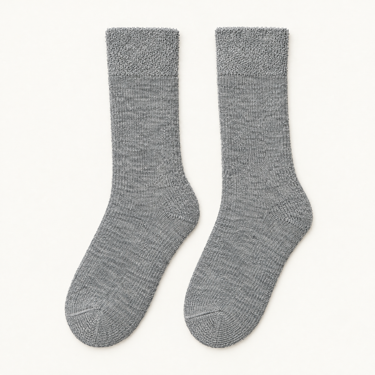 Pair of grey alpaca hiker socks laid flat