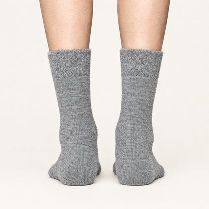 Grey alpaca hiker socks, back view of heels