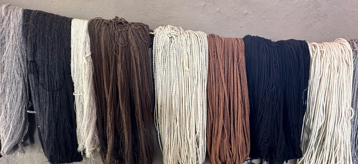Natural alpaca yarn in cream, brown, grey and black, hand-spun in the Andes